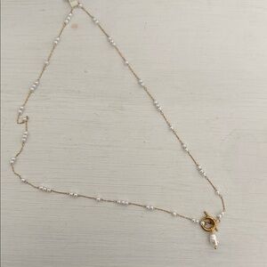 Elegant Gold and White Pearl Necklace